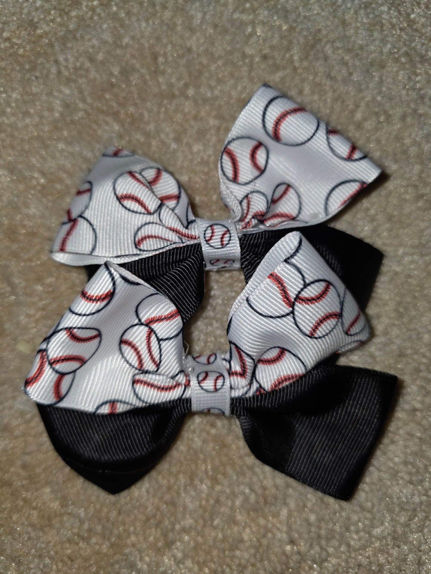 Baseball with Black ribbon